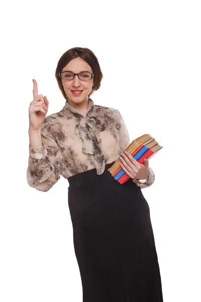 Woman in glasses with books showing thumbs isolated on white bac — Stock Photo, Image