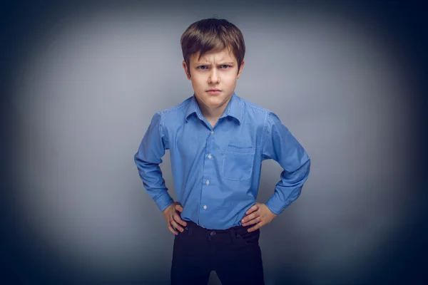 Portrait of a teenage boy frowning brown hair European appear — Stock Photo, Image