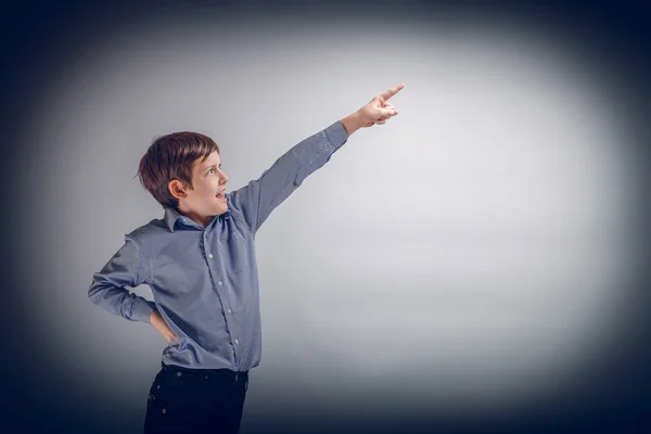 Boy adolescence European appearance Brown points finger up cross — Stock Photo, Image