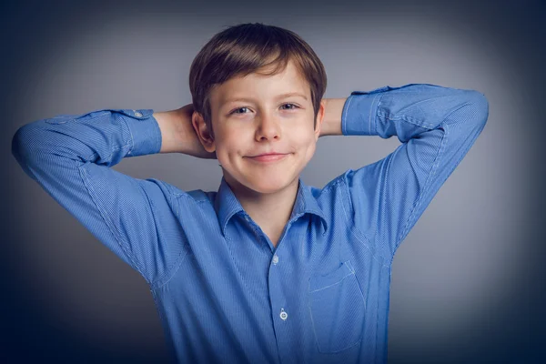 Teenager boy of 10 years European appearance feels joy — Stock Photo, Image