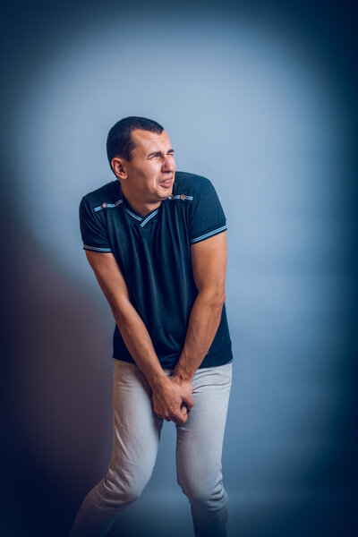 man of European appearance brunet pressed his hands