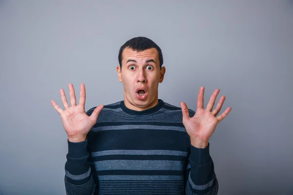 Hombre aspecto europeo años sorprendentemente abrió su mo —  Fotos de Stock