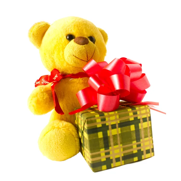 Gele teddybeer met cadeau — Stockfoto