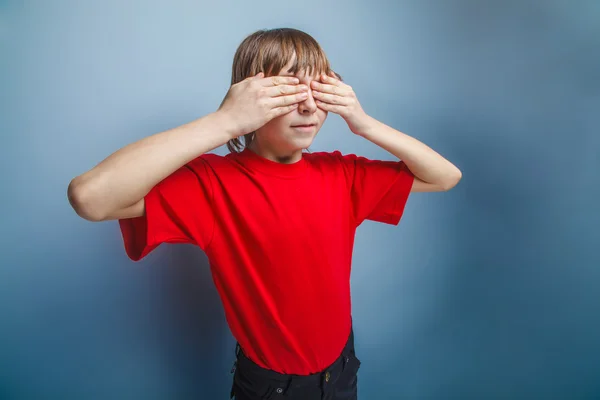 Boy teenager European appearance in a red shirt closed eyes with — Stock Photo, Image