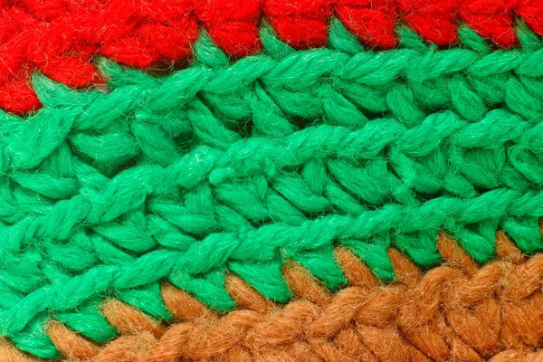 Knitting red green brown macro texture background — Stock Photo, Image