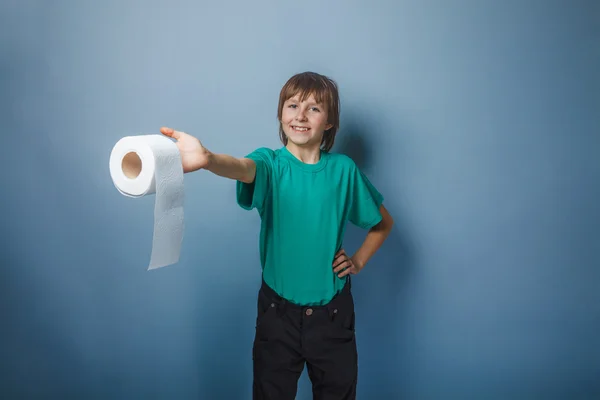 European-looking boy of ten years with toilet paper on a gray ba — Stock Photo, Image