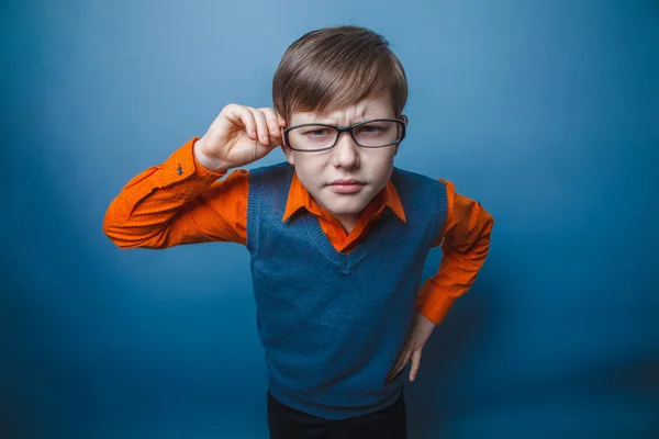 European-looking boy of ten years in glasses, anger, resentment — Stock Photo, Image