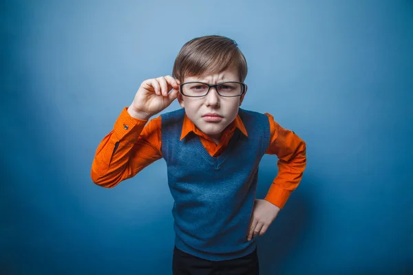 European-looking boy of ten years in glasses, anger, resentment — Stock Photo, Image