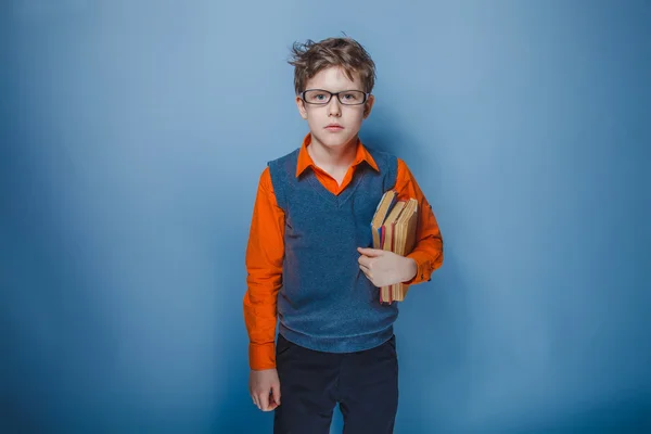 Boy teenager European appearance in retro clothes with books in — Stock Photo, Image