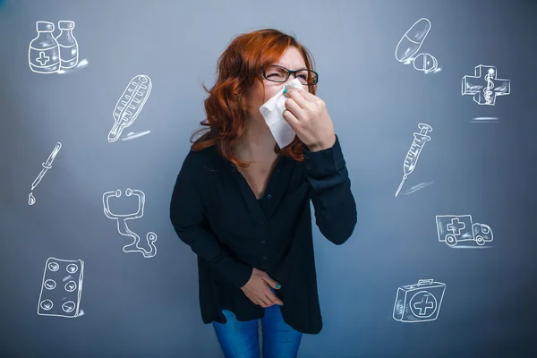 Woman is sick with influenza runny nose sneezing handkerchief in — Stock Photo, Image