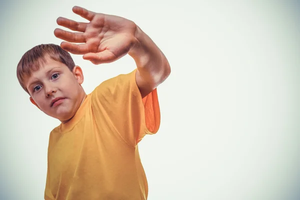 Teenager boy scared concealed hand from hitting domestic  violen — Stock Photo, Image