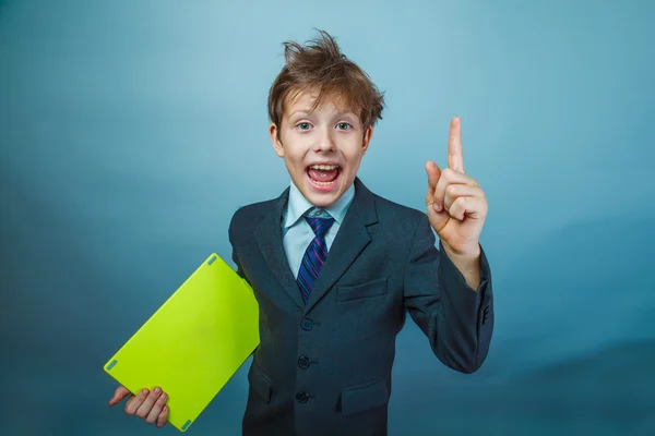 Teen boy businessman in a suit raised his finger up wild hair ho — Stock Photo, Image