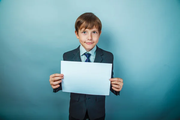 Giovanissima ragazzo cartello uomo d'affari holding segno su il sfondo di — Foto Stock