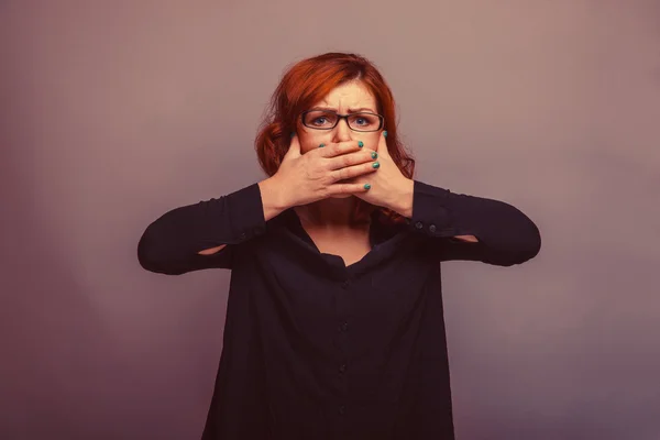 European-looking woman 30 years his hands over his mouth retro — Stock Photo, Image