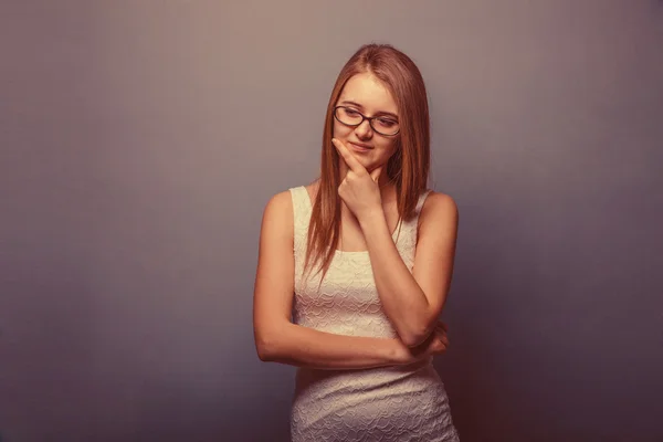 Woman in a white dress with glasses looking  away retro — Stock Photo, Image