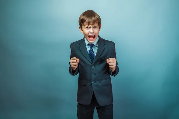 European appearance teenager boy blond hair in suit and tie scre — Zdjęcie stockowe