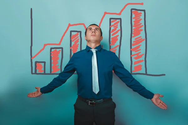 Man businessman arms outstretched to the sides looking up graph — Stockfoto