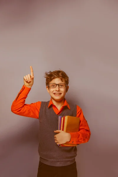 European-looking  boy of ten  years in glasses thumbs up, the id — Stock Photo, Image