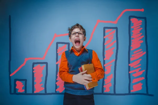 A boy of twelve European appearance in a suit holding a blank sh — Stock Photo, Image