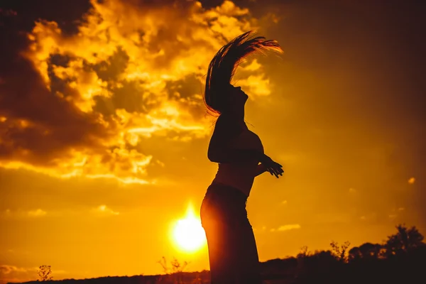 European appearance young woman lifted her head up waving hair i — Stok fotoğraf