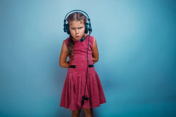 He girl child is seven years old in a pink dress with black head — Stock Photo, Image