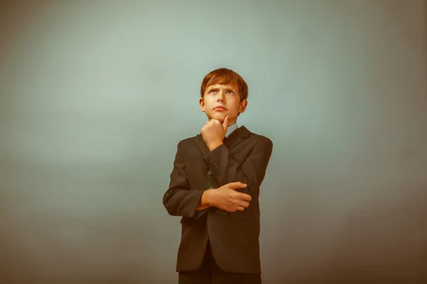 Teenage boy looking up thinking businessman view idea strategy o — Stock Photo, Image
