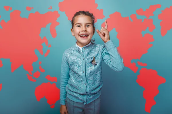 Giovanissima ragazza ha alzato il dito su idea mappa del mondo educazione sfondo — Foto Stock