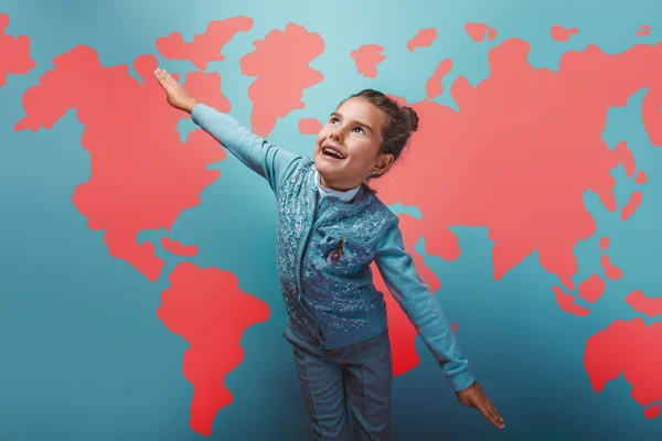 Teen girl her arms flying  behind world map education background — Stok fotoğraf