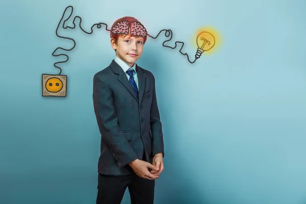 Boy dressed businessman is charging cord plug wire igniter charg — Stock Fotó