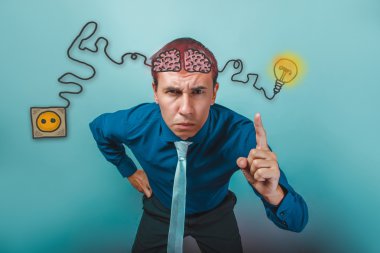 businessman raised his index finger up and frowned alert brain b