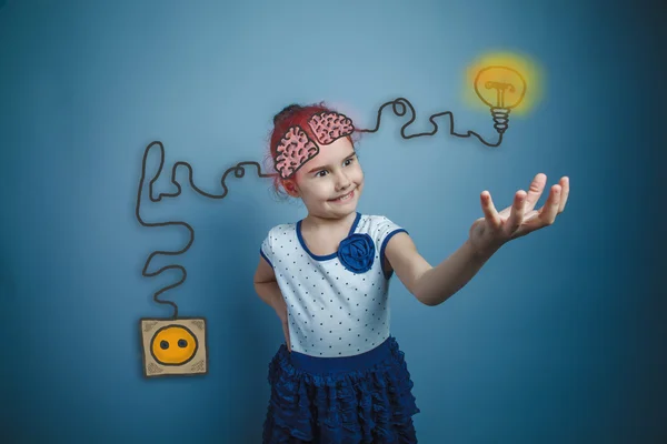 Een girl held out her hand forward smiling charging cord plug wi — Stock fotografie