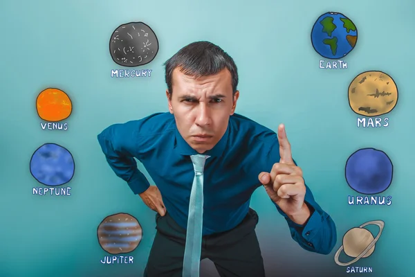 Businessman raised his index finger up angry planets of the sola — 图库照片