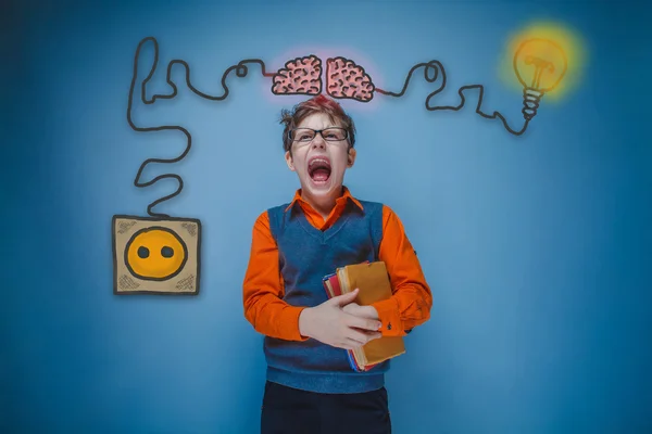 Teenage boy holding a book and shouting his mouth agape charging — Stock Fotó