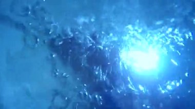 Kabarcıklar mavi arka plan doku ışık hareket su