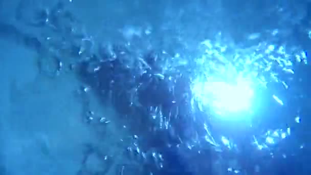 Burbujas de agua textura de fondo azul Light Motion — Vídeo de stock