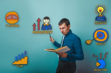 businessman reading a book man frowned and shows a pencil on a c