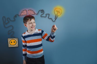Teenage boy laughing and holding a finger subject igniter charge