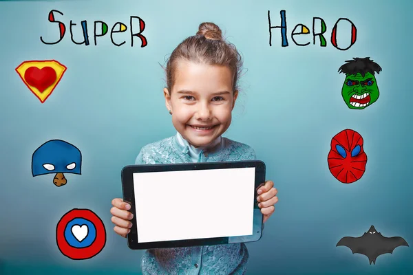 Girl holding the tablet and rejoice smile super hero super power — Stock fotografie