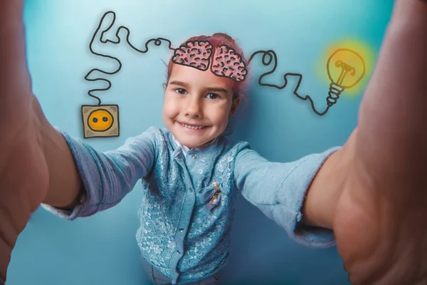 Teenage girl shoots herself and laughs contentedly charging cord — Stok fotoğraf