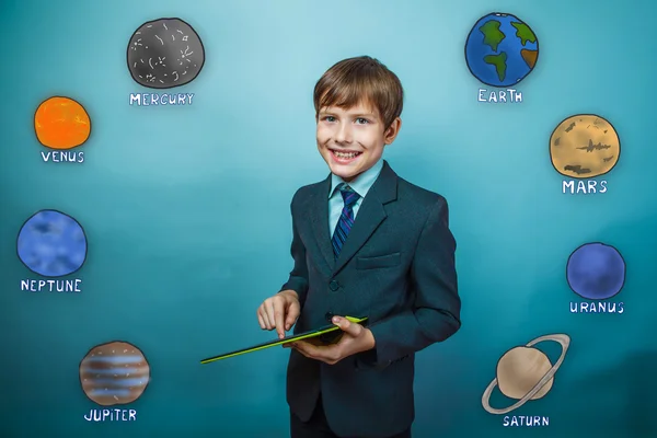 Youth teenager boy laughing businessman holds hand tablet planet — Φωτογραφία Αρχείου
