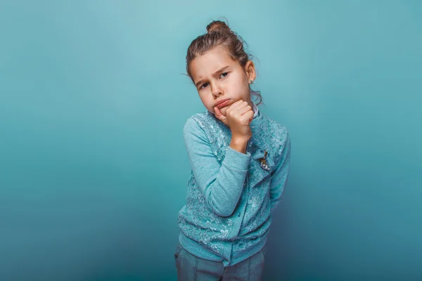 Teen girl of European appearance seven years thinking pouted hol — Stock Photo, Image