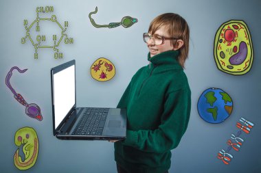 Teenage boy in glasses holding a laptop in hands and laughs icon