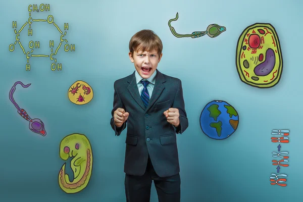 Teenage boy in a business style suit yelling opened his mouth cl — Stock fotografie