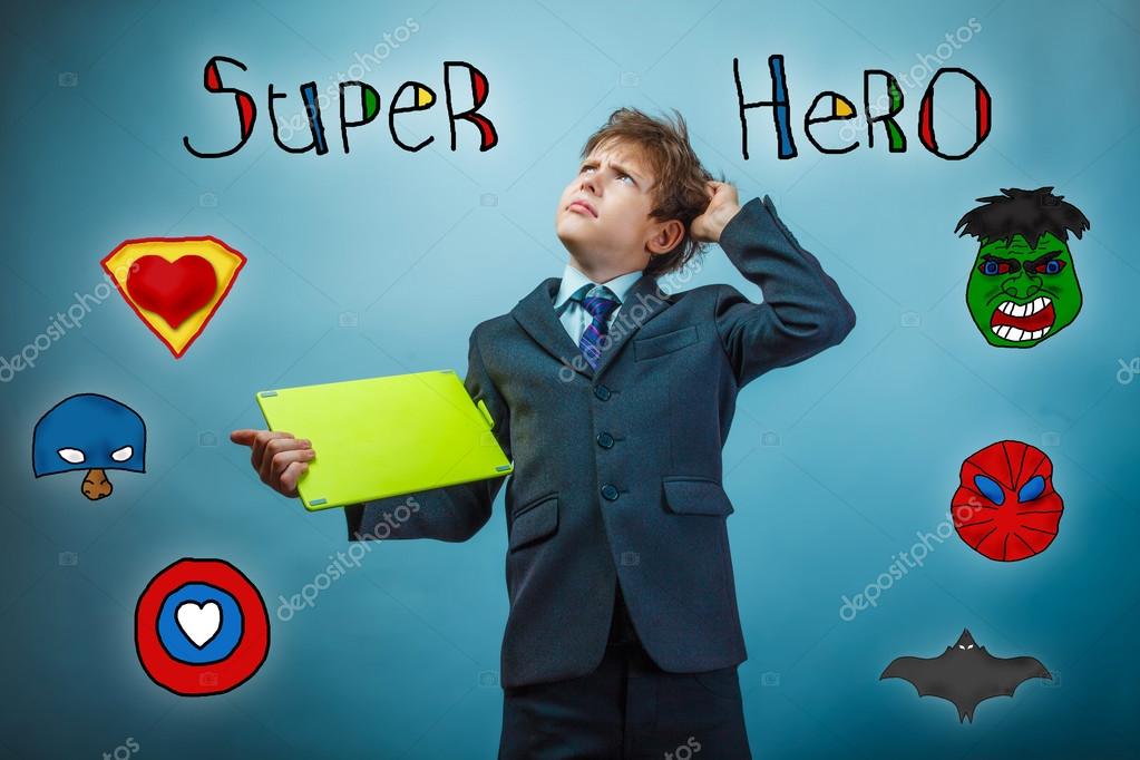 Teen Boy Businessman Holding A Tablet And Scratches His Head Pon Stock Photo Teen Boy Businessman Holding A Tablet And Scratches His Head Pon Stock Photo