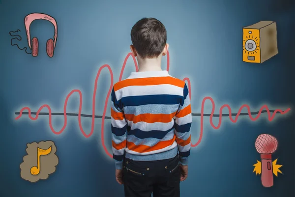 The boy turned his back on a sound wave music radio sketch symbo — Stockfoto