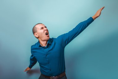 a man of European appearance thirty years of hands apart gesture