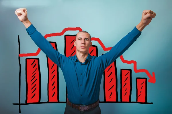 A man raised his hands up the victory sign businessman chart cri — Stock Photo, Image