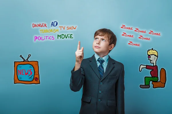 Adolescent boy businessman points his finger upward influence of — Stock fotografie