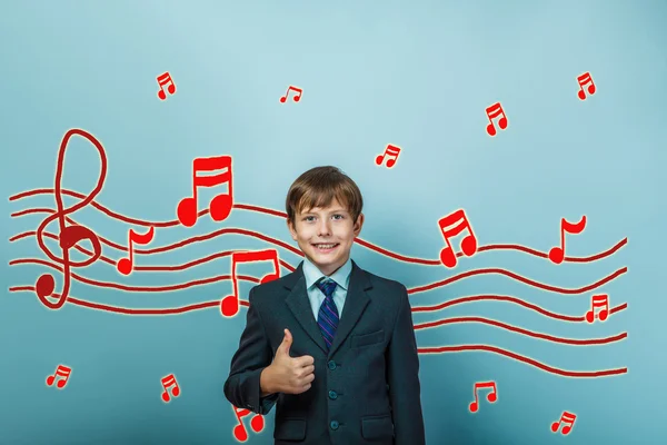 Jongen tonen teken ja muziek notities schets tiener voorkomen geluid — Stockfoto
