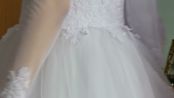 The bride dress knotted strings behind back — Stock Video